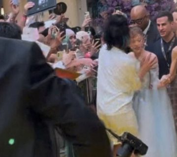 ariana-grande-rushed-by-red-carpet-intruder-at-film-premiere